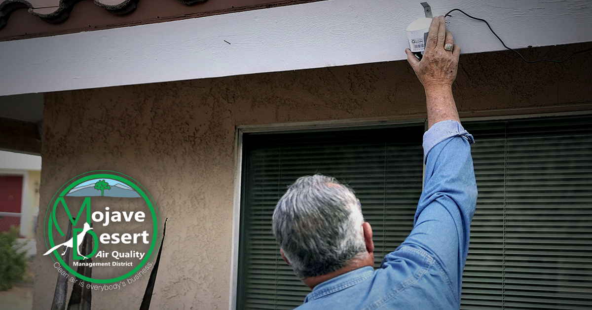 Apple Valley resident installs Purple Air sensor on his home.